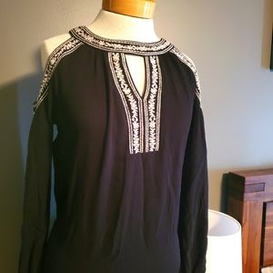 Black dress with white embroidery